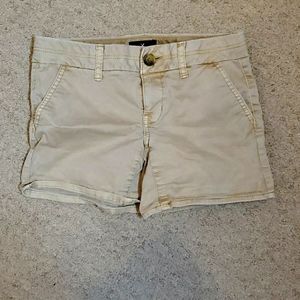 Khaki American Eagle midi stretch shorts